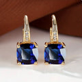 Mystické kruhové náušnice se safírem